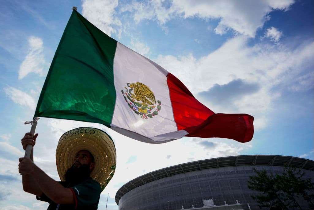 YEKATERINBURG, RUSSIA - JUNE 27: A fan of Mexico waves a flag prior to the 2018 FIFA World Cup Russia group F match between Mexico and Sweden at Ekaterinburg Arena on June 27, 2018 in Yekaterinburg, Russia. (Photo by Carlos Cuin/Jam Media/Getty Images)