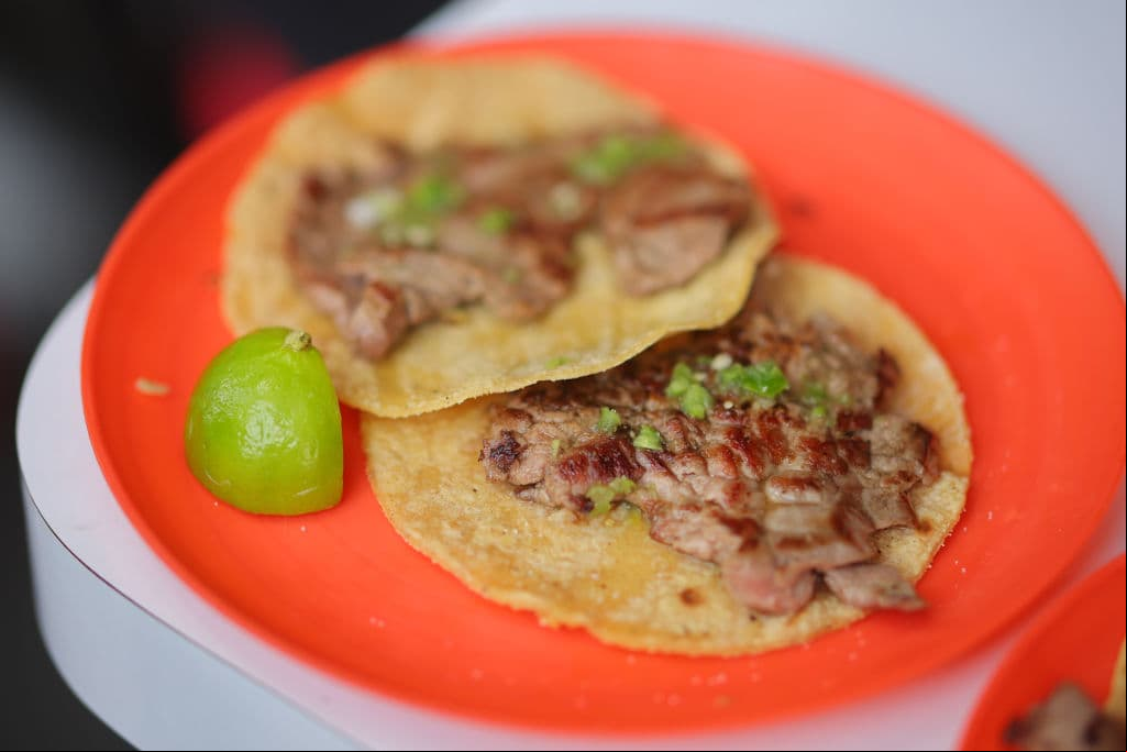 MEXICO CITY, MEXICO - MAY 16: Detail of a Gaonera taco during a visit to 'El Califa de Leon' on May 16, 2024 in Mexico City, Mexico. The traditional 'El Califa de Leon' became the first Mexican 'Taqueria' (Taco stand) to be awarded by the worldwide known 'Michelin Guide' in the first ever 'Michelin Guide Mexico' published this week. The place was opened in 1968 and its located near Mexico City's downtown becoming a very popular spot to try the traditional Mexican Taco; its more famous dish is a taco called 'La Gaonera' named in honor of a bullfighter. (Photo by Hector Vivas/Getty Images)
