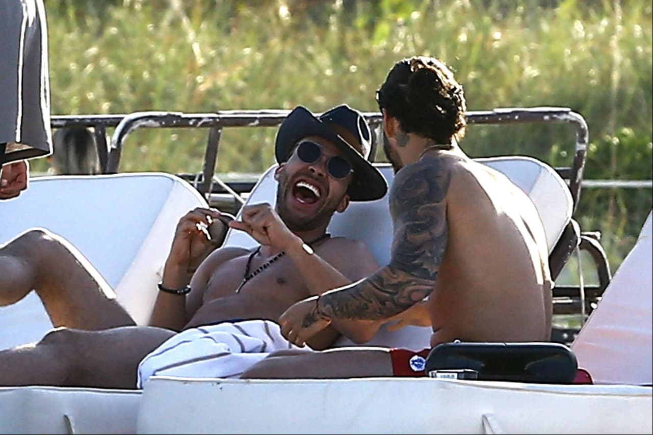 ¡Qué tal! Juntos y sin camisa en Miami.